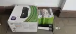 Selling xbox 360 with 14 original games and remote and kinect all new