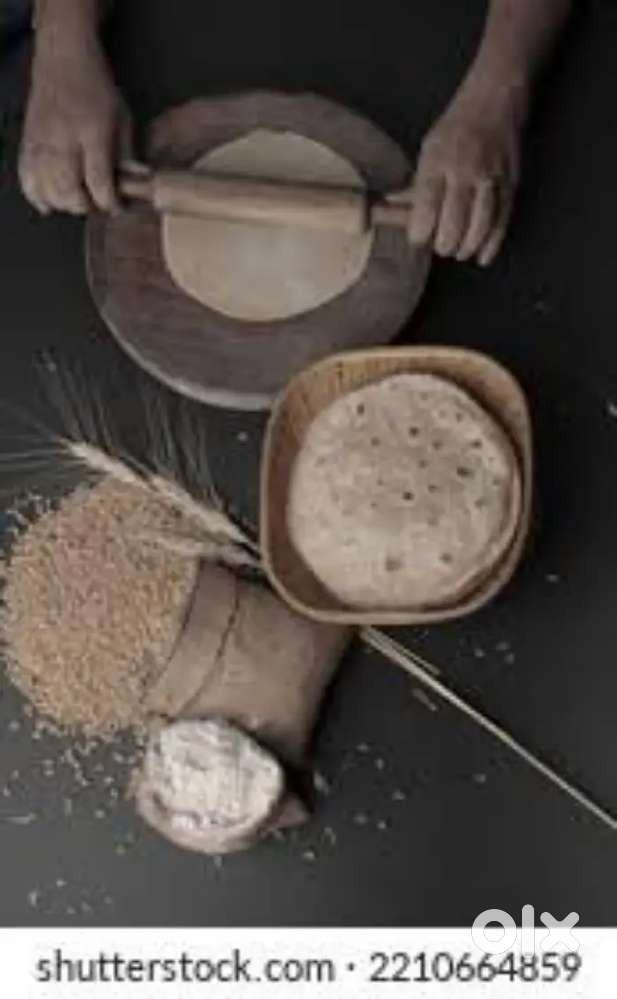Female cook Roti making in Tollygunge