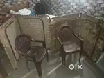 2 Portable folding bed with metal frame and 2 plastic chairs