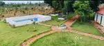 Gated community Managed Farm land with weekend home 6534sqft