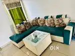 Sofa with glass center table