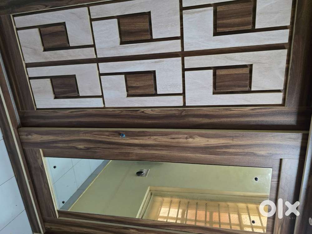 Wooden wardrob with sliding door