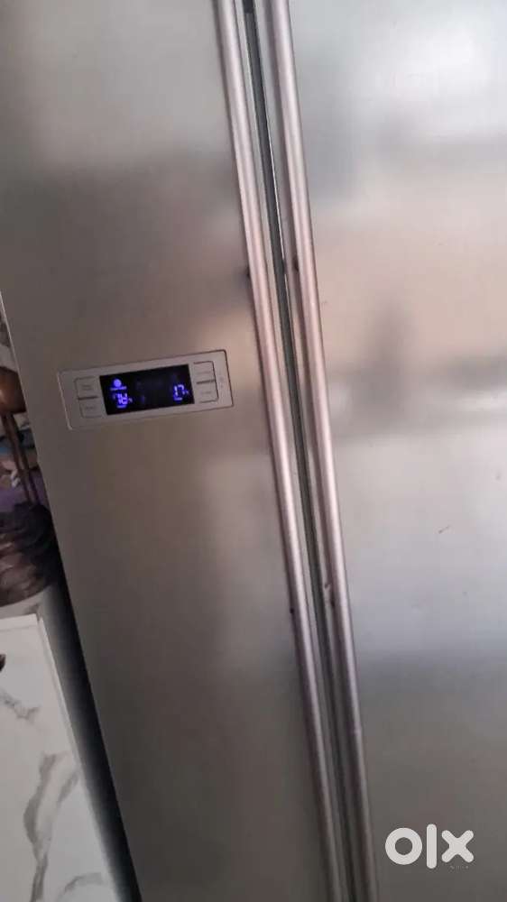 600 ltr side by side refrigerator working in mint condition