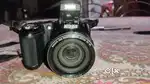 Nikon camera. Belt battery charger.