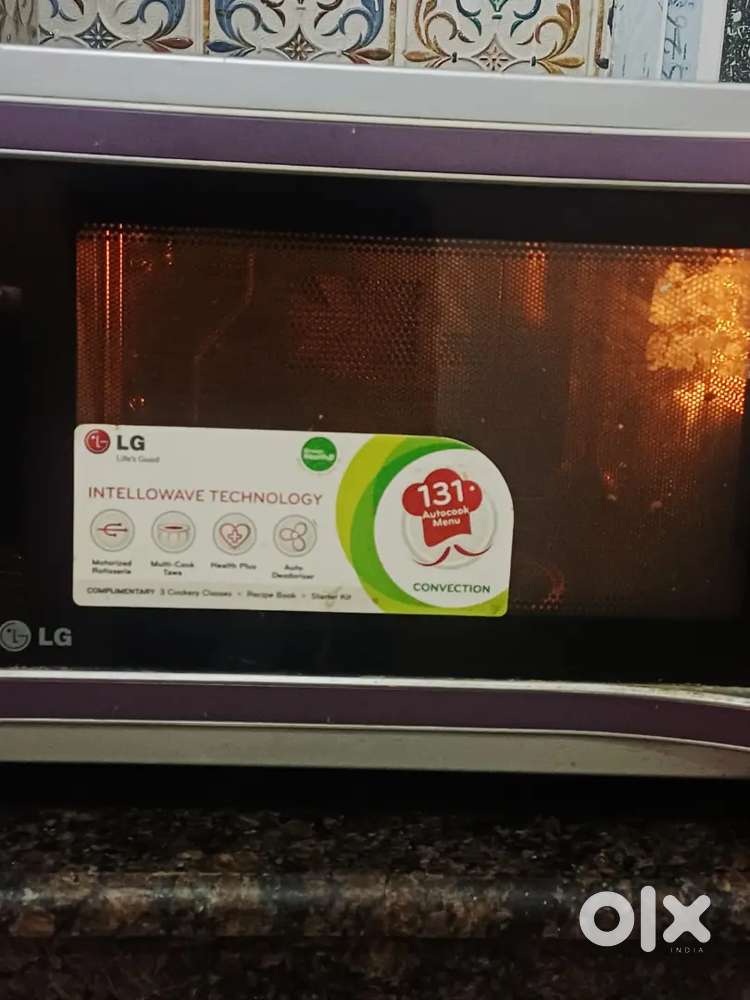 LG 28LConvection Microwave Oven Excellent Condition with toasting fork