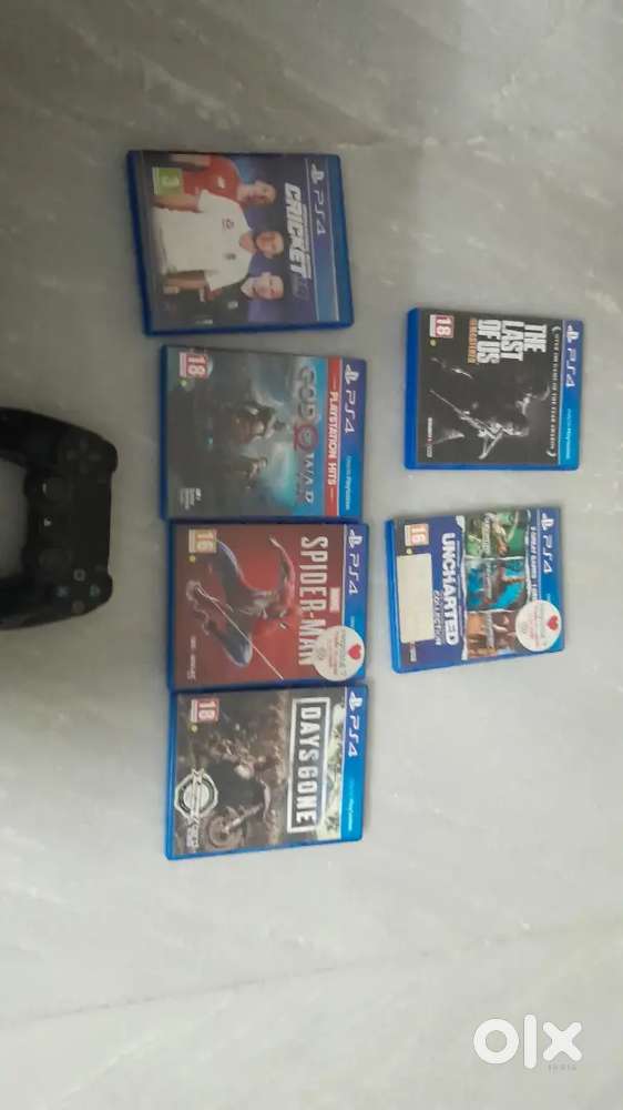 Playstation 4 second hand Controller and 5 ps4 games