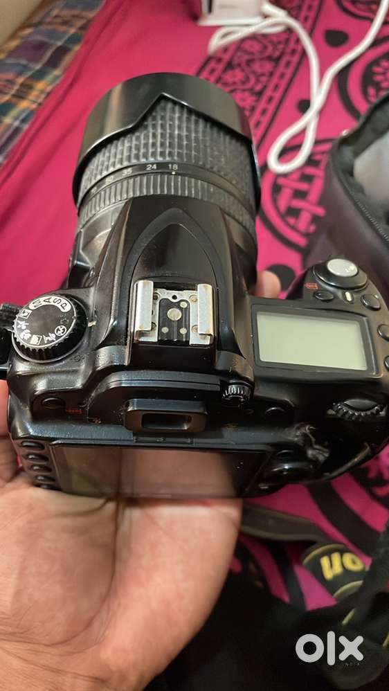 Nikon D90 camera with additional lens