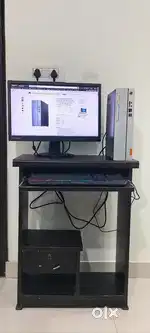 Lenovo computer with desk, monitor, keyboard and mouse