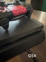 Ps4 slim 1Tb jet black with two duel shock controllers
