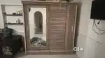 Bed and cupboard