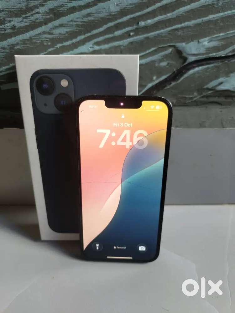 Iphone 13 128 mobile good condition but back side light brown