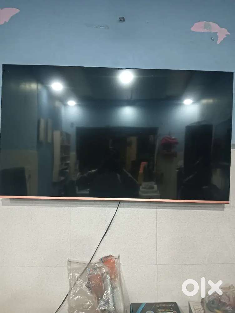 55 inch led tv one month old smart Full android voice remote.
