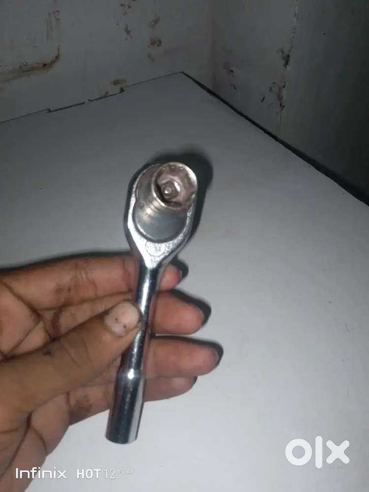 12 mm ratchet handle with socket - good condition