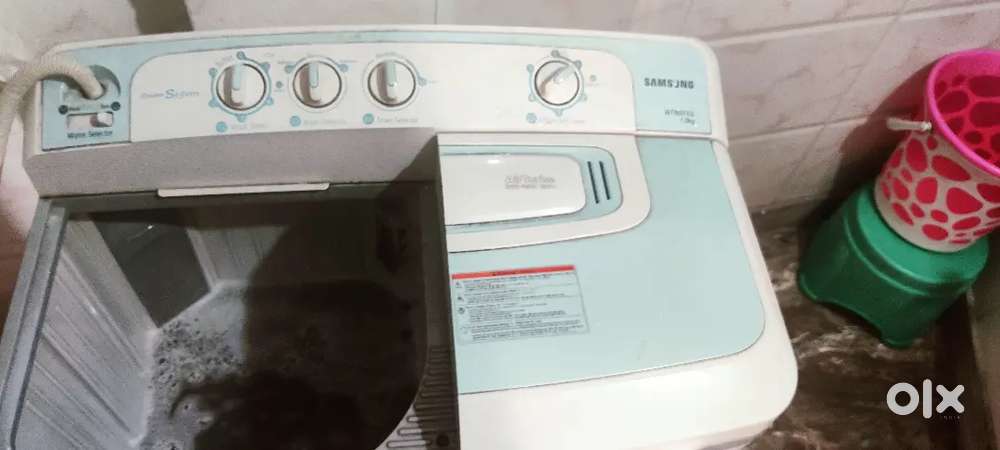 Samsung 7 kg semi automatic machine top load, brand new condition.