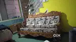 3 seater Teakwood sofa with cushion in excellent condition for 13000rs