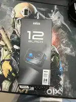 Go pro 12 black brand new with sd card