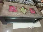 Wooden center table with glass