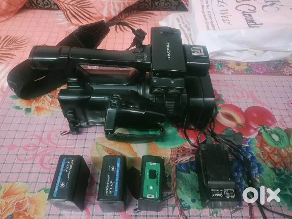 Sony NX 100 or canon 80ad 18.135 lens ka satb