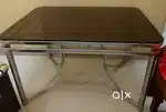 Glass top steel Dining table