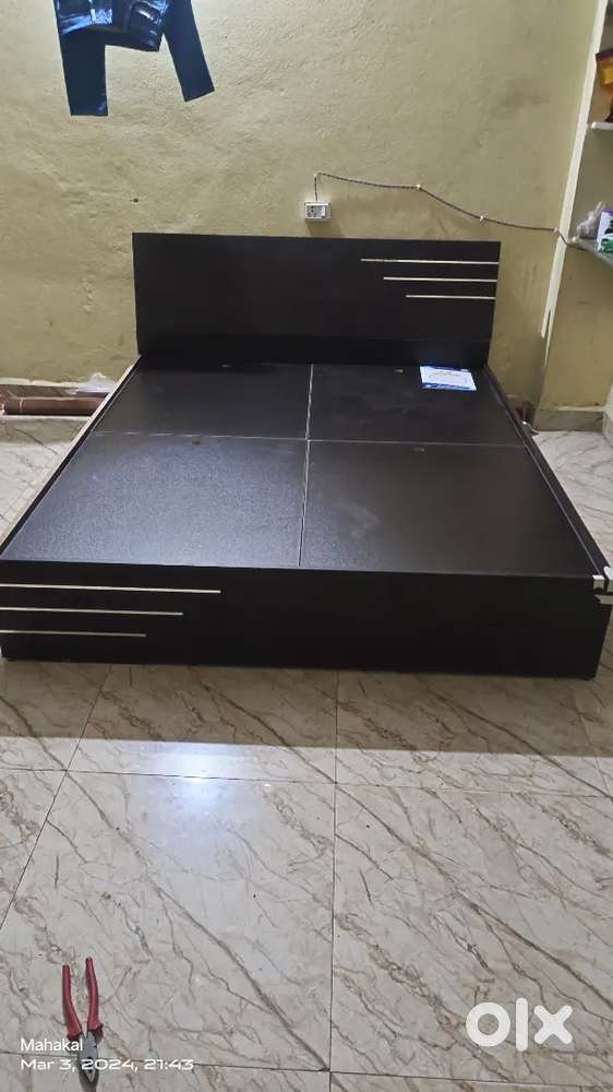 Double bed 6 by 5 new particle board bed
