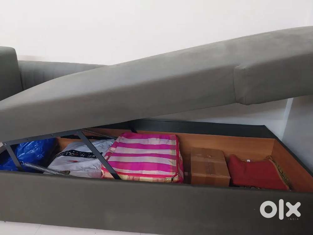 Sofa cum bed with storage
