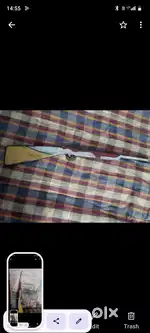 A toy wooden gun