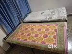 2 Single Beds with mattress (can be used as a double bed)