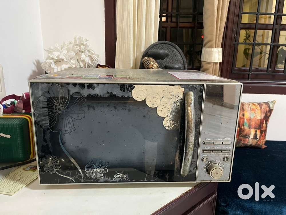 Godrej microoven 5 year old 22 litre capacity