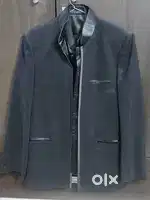 Three piece black party wear suit for men