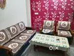 Furnished floor with bed sofa table refrigerator coller gyser gas