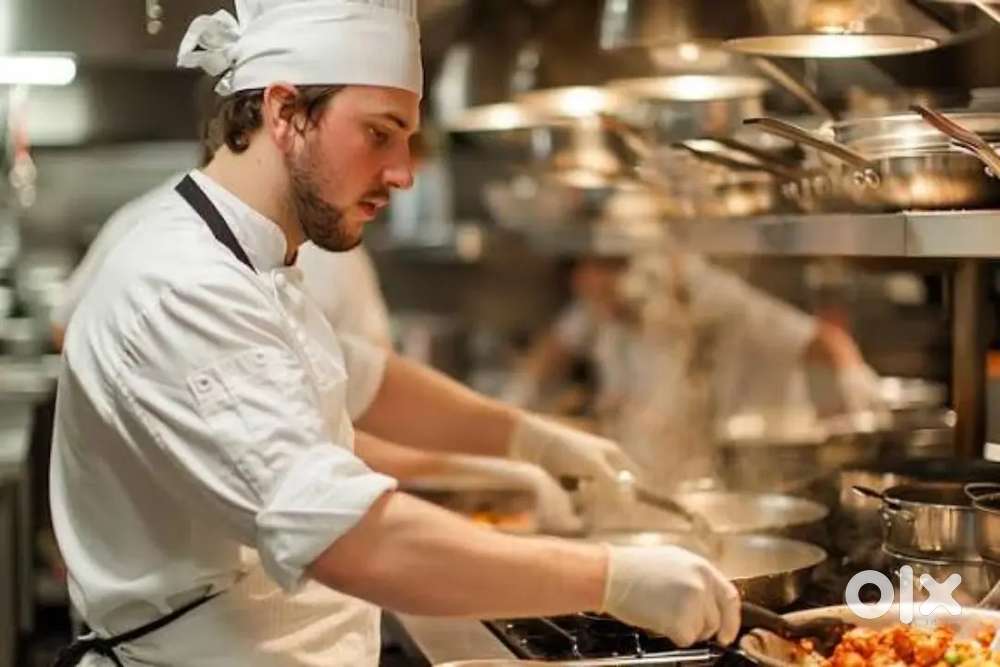 Multitasking chef cook in hotel