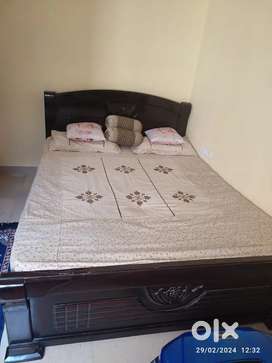 Solid wood double bed with mattress (price negotiable)