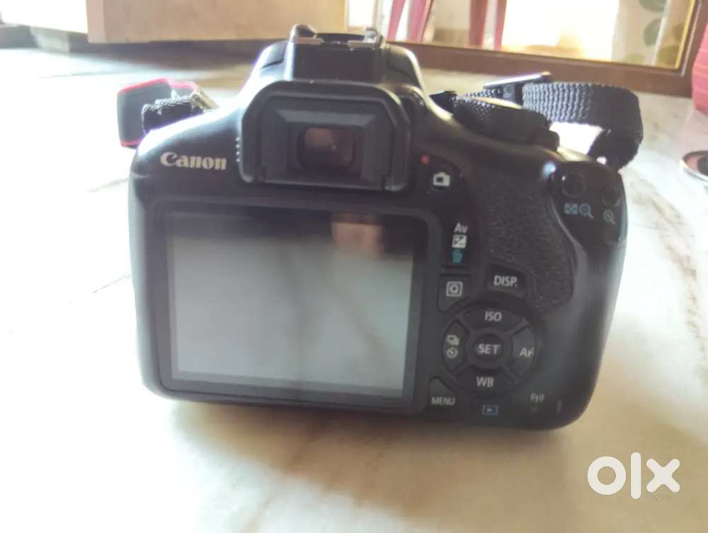 Canon 1300 camera 18-55 lence good condition