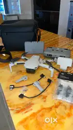 DJI Mini 2 Fly More Combo Drone, less ues