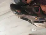 Red tape shoes with dial lace system