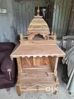 A wooden throne is sold
