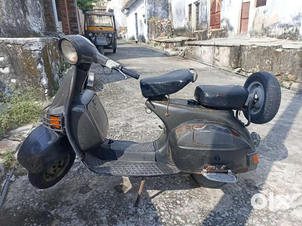 A scooter bajaj 2012 model , petrol