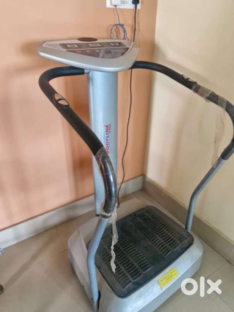 Exercise Bike and Pro Bodyline Crazy Fit Massager available for sale