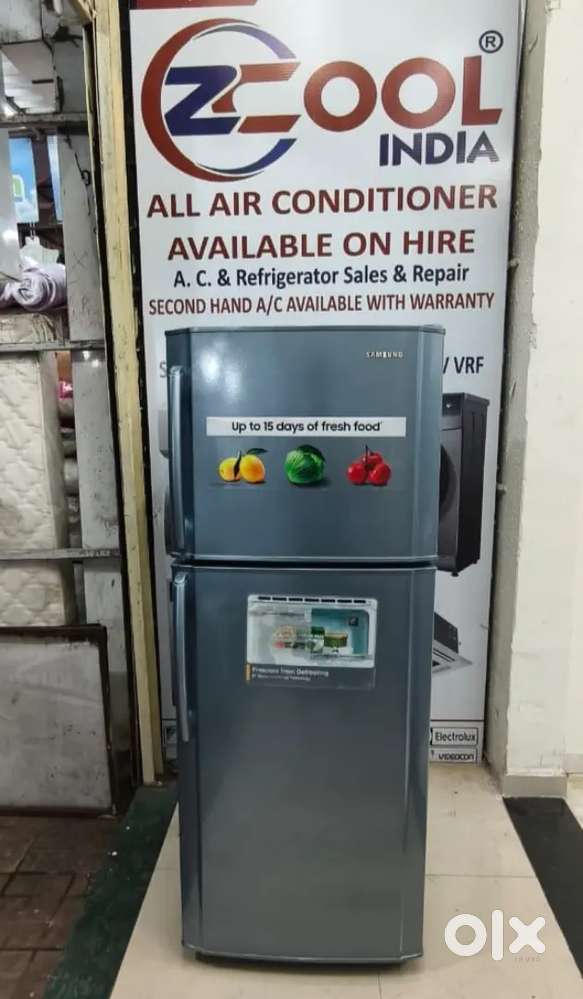 Samsung double door fridge good condition with warranty 1 year old