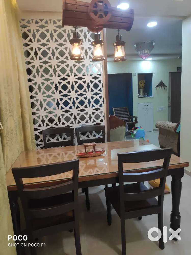 6 seater Teak wood heavy dining table with 4 chairs