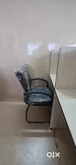 Cushioned arm chair