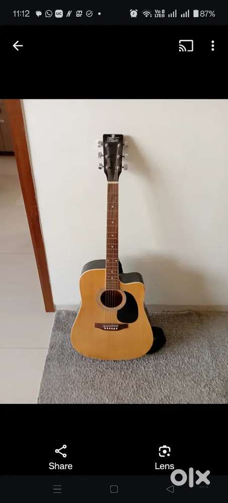 Pluto acoustic guitar with strings and tuner