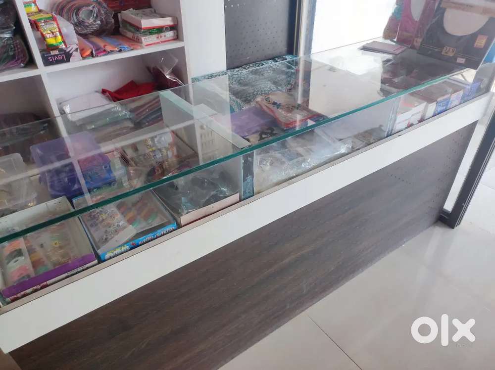 Garments shop Racks ×7 , counter table