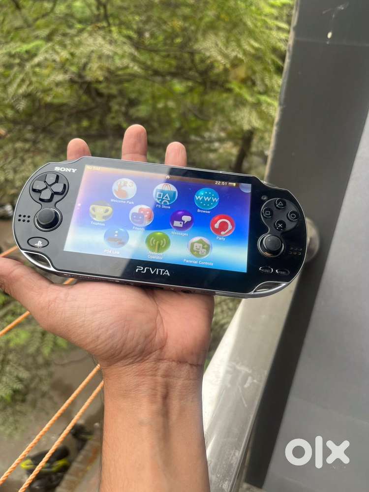 Sony ps vita with 8gb memory card and cover