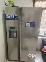 Samsung fridge side by side 585 litres with water and ice dispenser