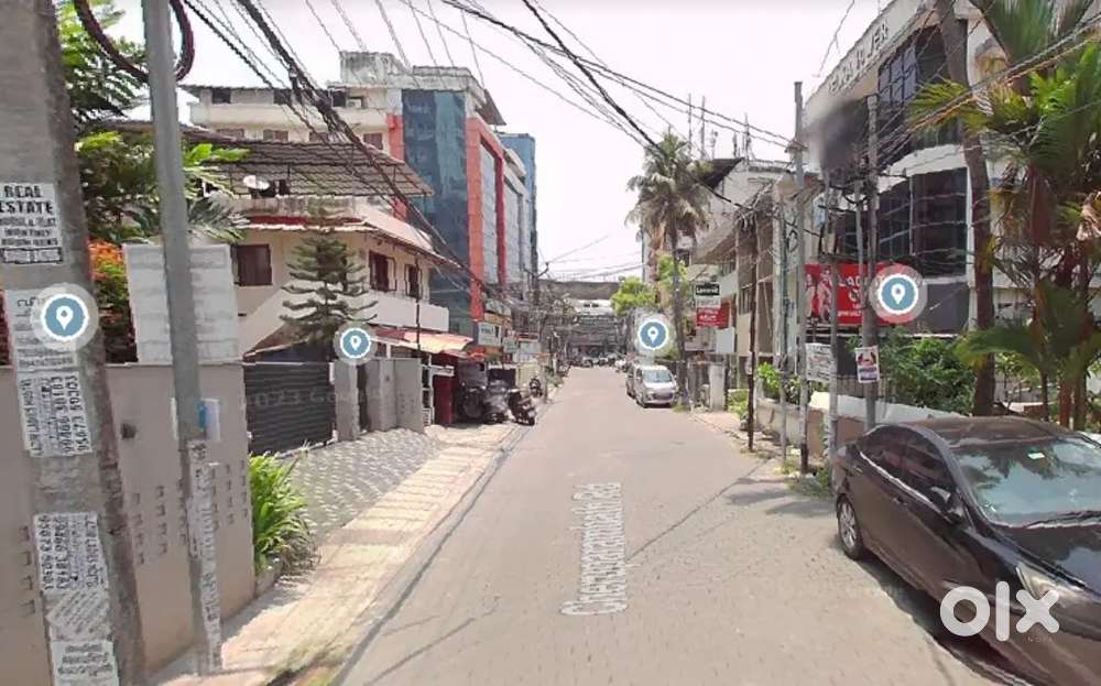 8 cent 7000 sqft 3 floor building near Erattupetta Mly rental 1 lakh