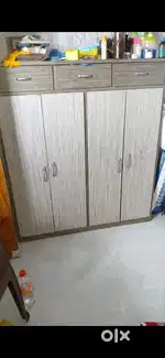 Urgent selling cupboard in a very good condition full made of surmica