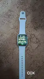 “Smartwatch with Charger  Good Condition  White Strap”