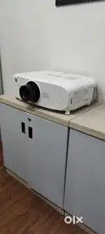 Selling panasonic projector PT-EZ580 model all geniun fully working