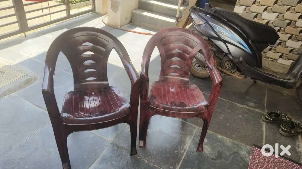 Two plastic chairs